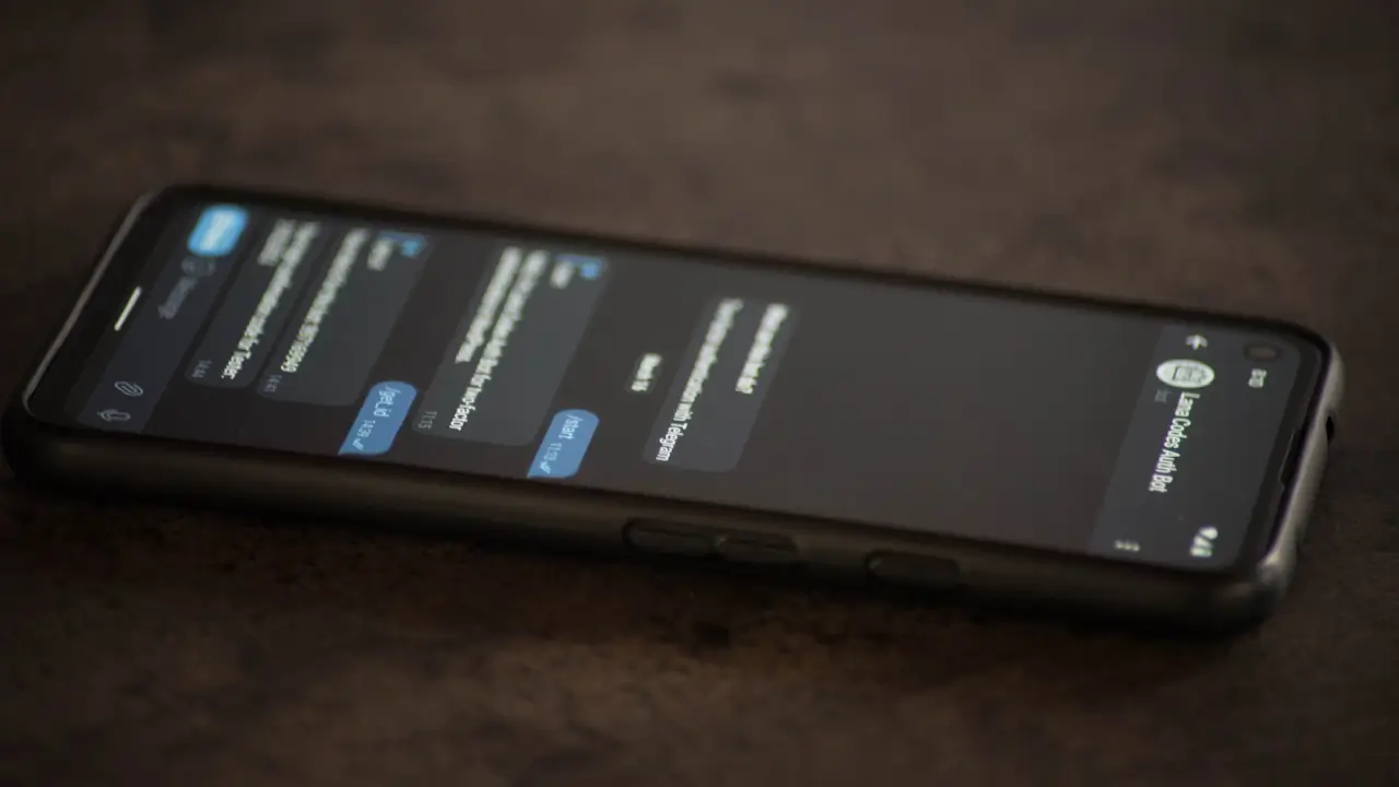 telegram message displays on phone laying on the table